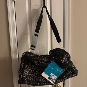 NWT  Pacific coast signature/Highland.  Stylish Black and brown Duffel Bag.